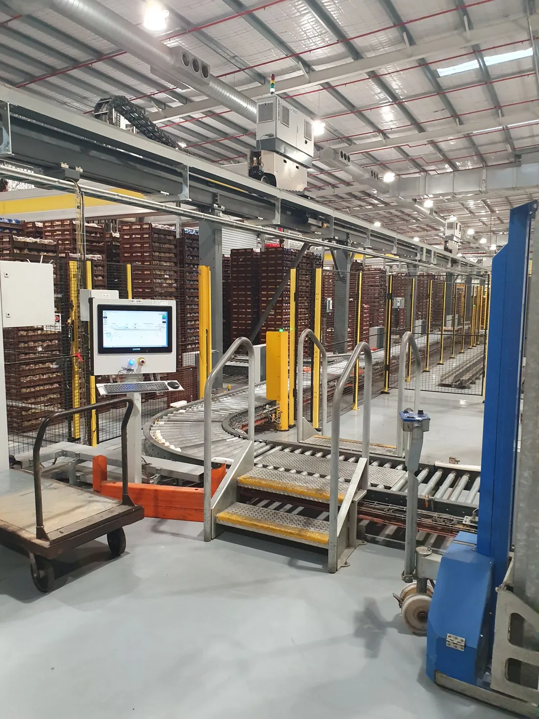 Automated crate handling and conveyor system